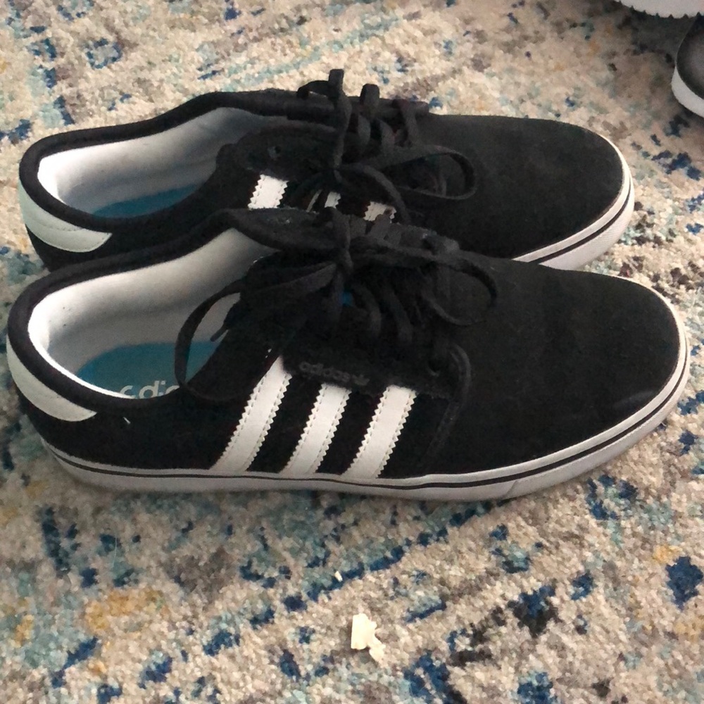 Adidas size 8 in woman’s, 6 in men’s worn a few times